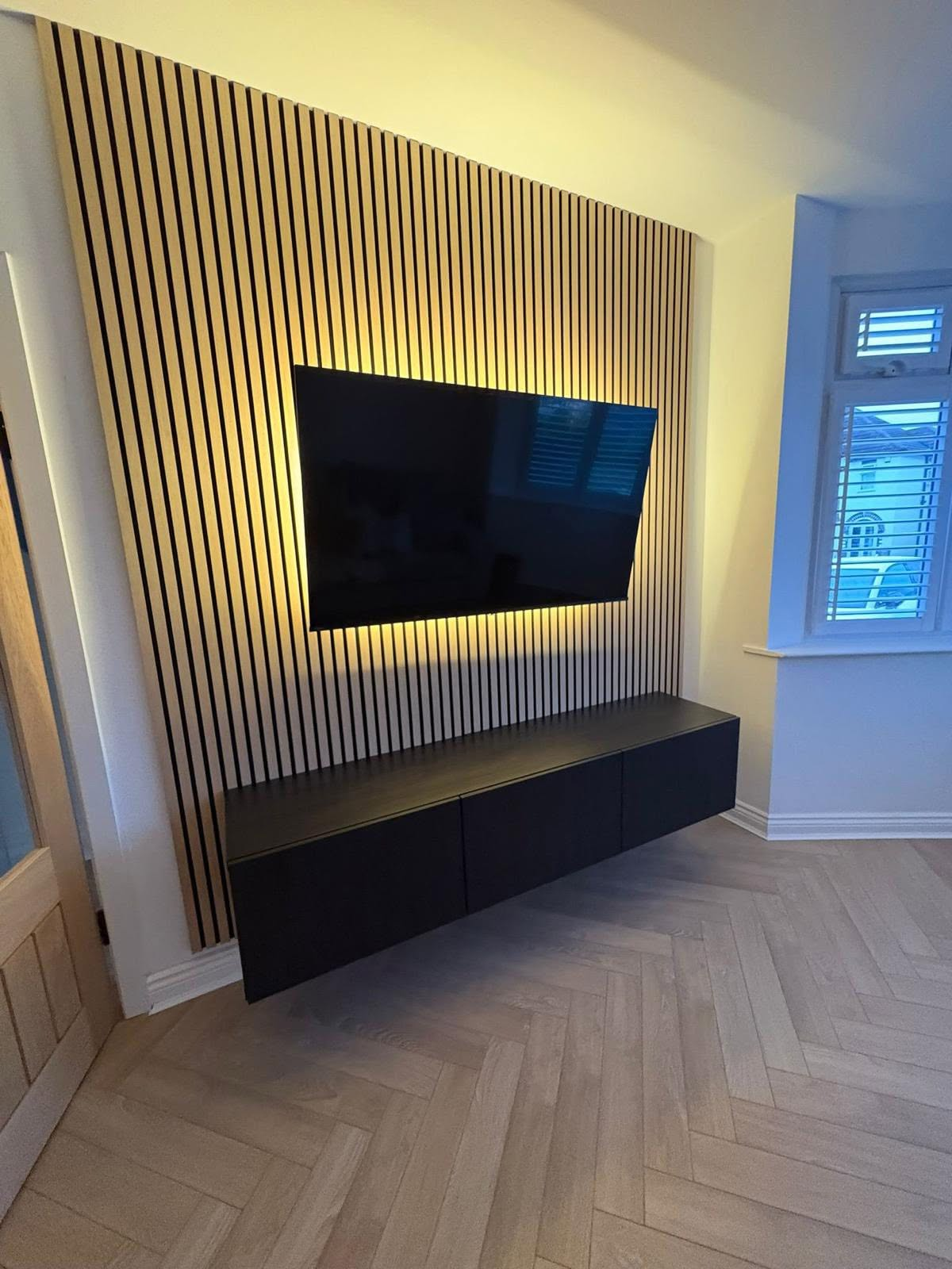 Slatted TV Wall With LED Backlighting